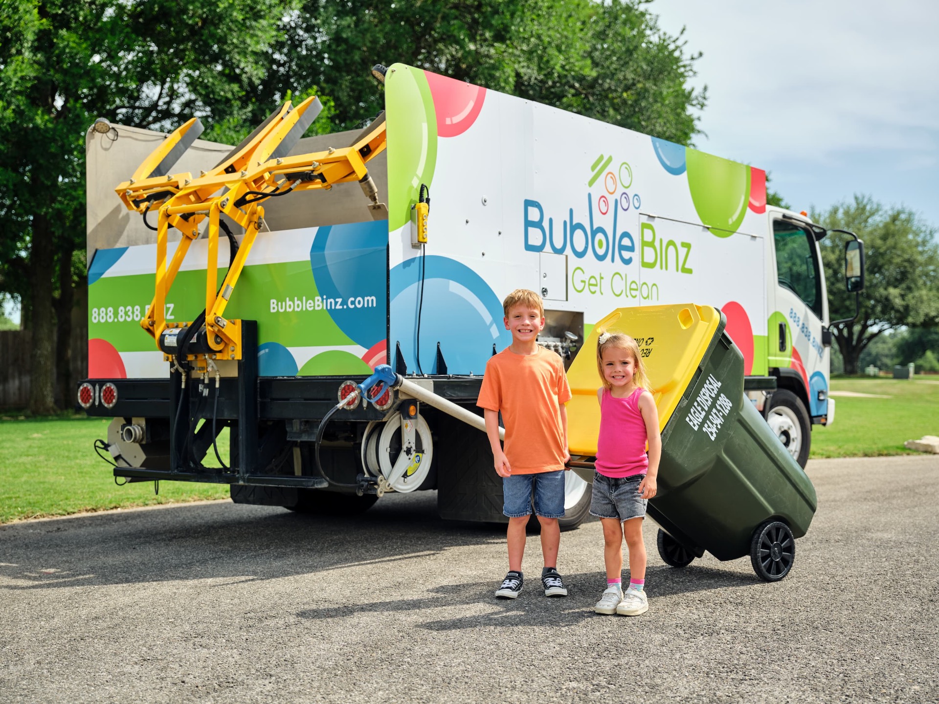 Kids with Bubble Binz truck